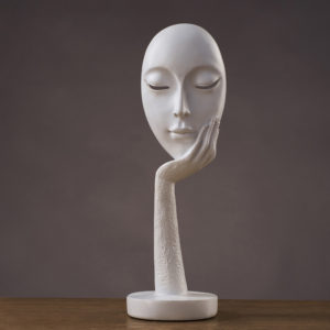 White Face on Hand Abstract Statue